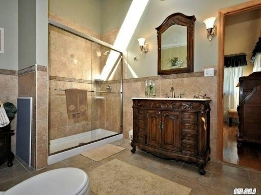 Surprisingly Spacious and Expanded Ranch in Sayville - Updated - photo 15