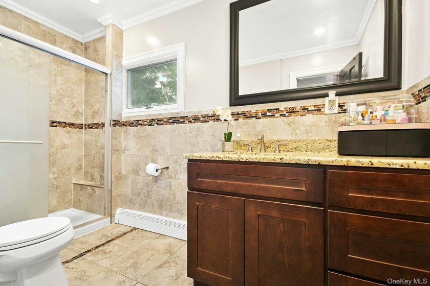 Surprisingly Spacious and Expanded Ranch in Sayville - Updated - photo 19