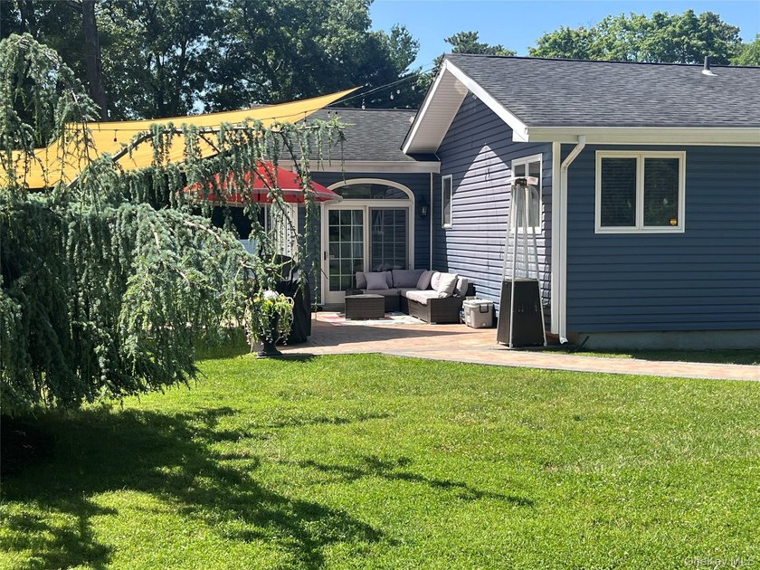 Surprisingly Spacious and Expanded Ranch in Sayville - Updated - photo 32