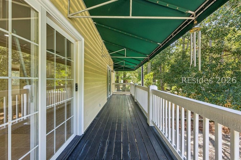 Tucked behind wrought iron gates on over four private, fenced - photo 44