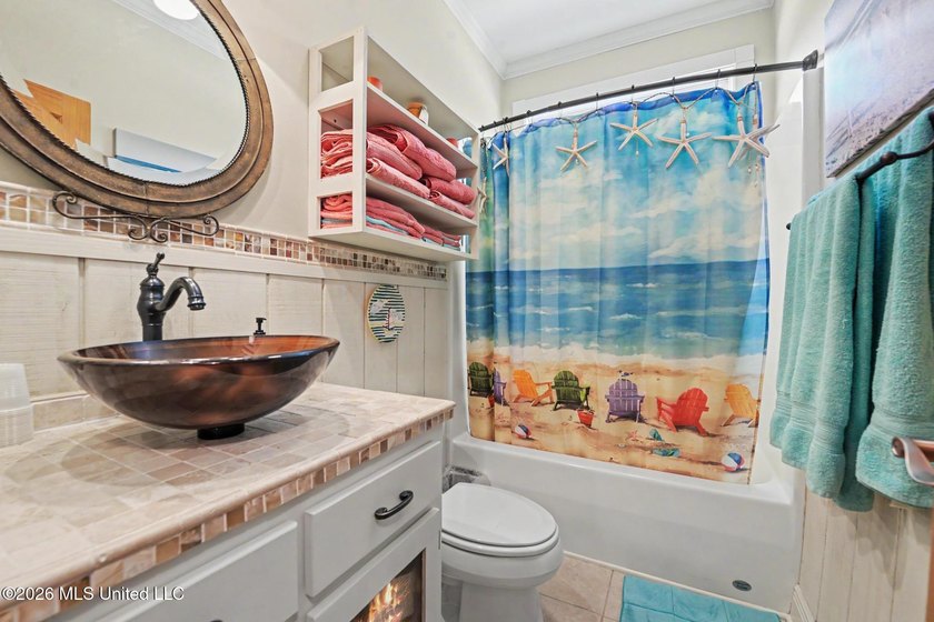 Experience coastal living at its finest in this beautifully - photo 19