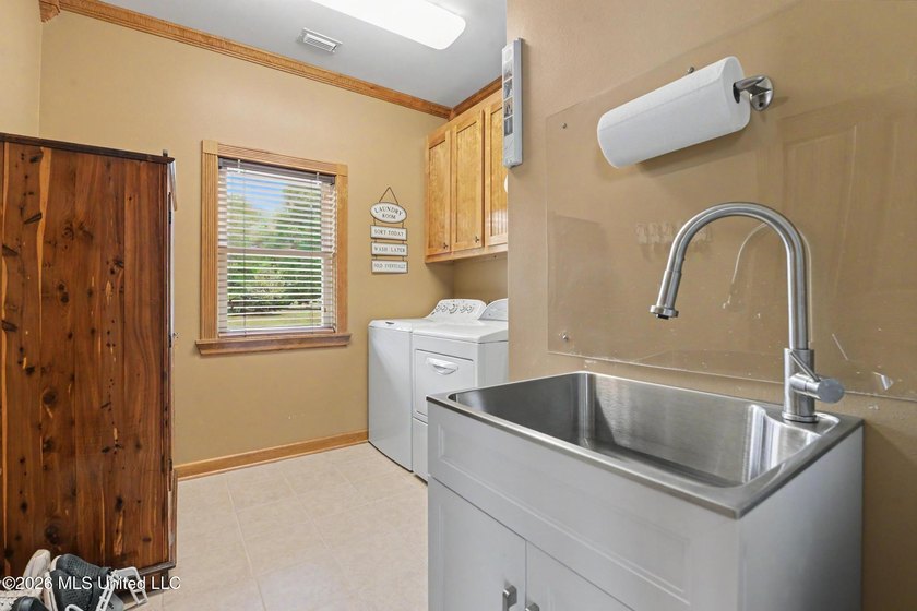 Experience coastal living at its finest in this beautifully - photo 21