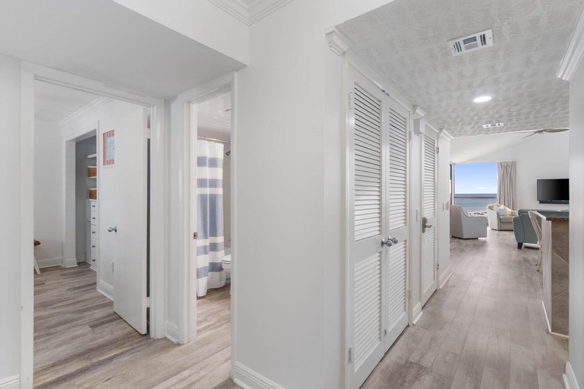 Experience elevated coastal living from this penthouse-level - photo 3