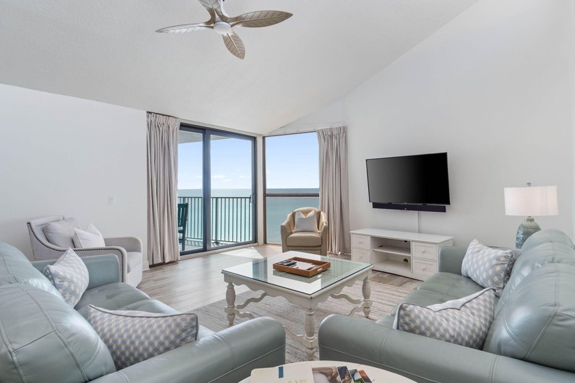 Experience elevated coastal living from this penthouse-level - photo 7