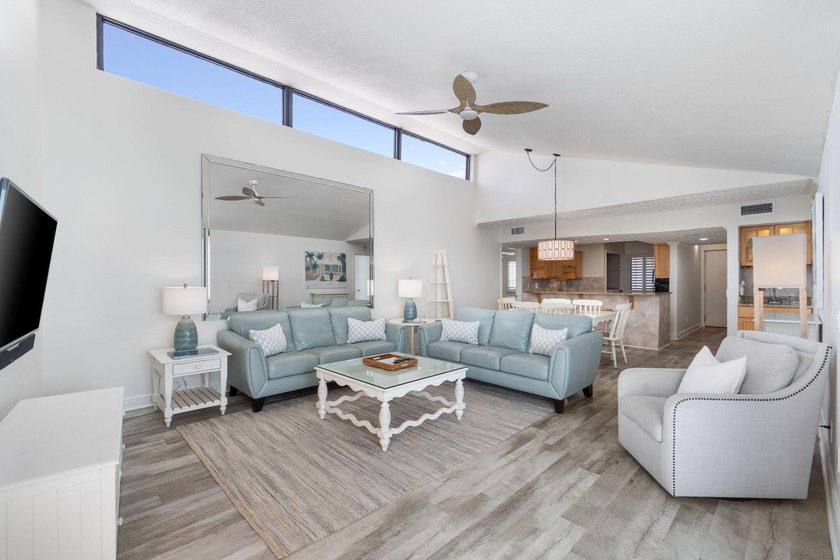 Experience elevated coastal living from this penthouse-level - photo 9