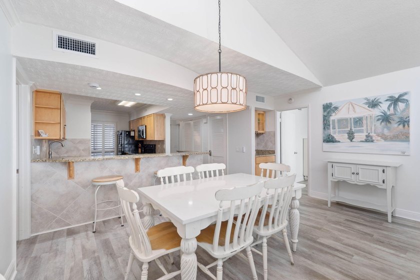 Experience elevated coastal living from this penthouse-level - photo 10