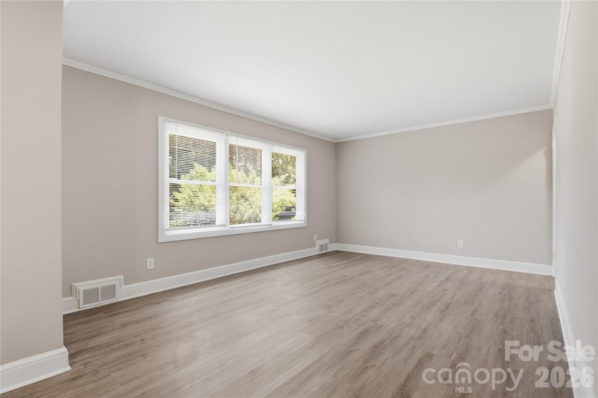 Welcome home to this charming ranch, situated on a spacious 0 - photo 3