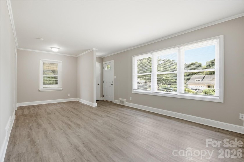 Welcome home to this charming ranch, situated on a spacious 0 - photo 4