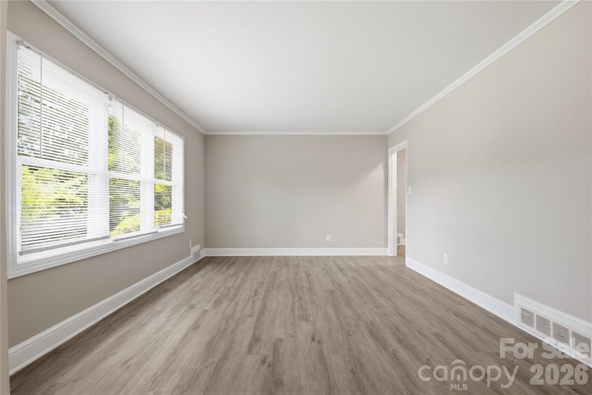 Welcome home to this charming ranch, situated on a spacious 0 - photo 7