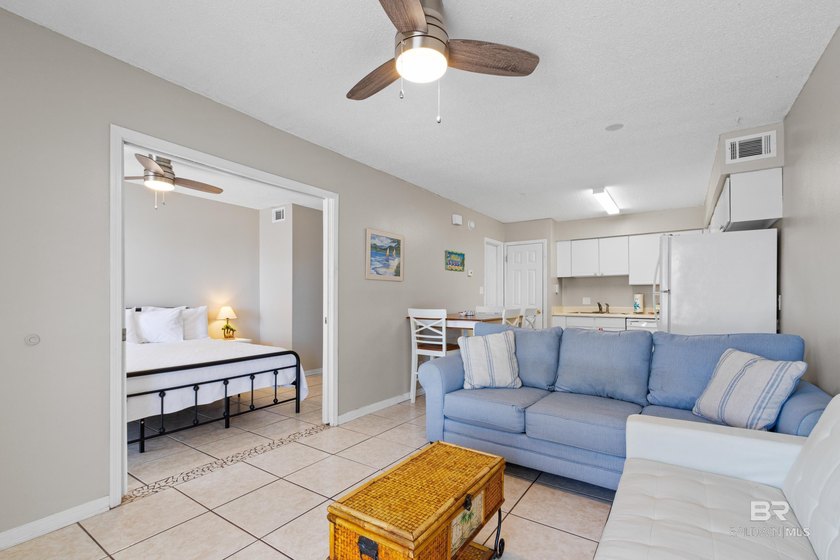 Step into easy coastal living at The Cove-a centrally located - photo 3