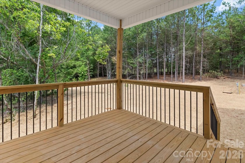 New Construction ranch home on large lot with bonus room above - photo 11