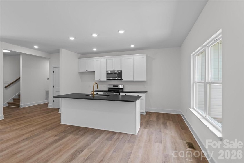 New Construction ranch home on large lot with bonus room above - photo 17