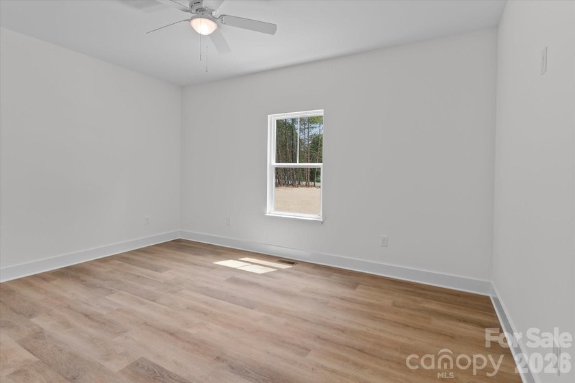 New Construction ranch home on large lot with bonus room above - photo 20
