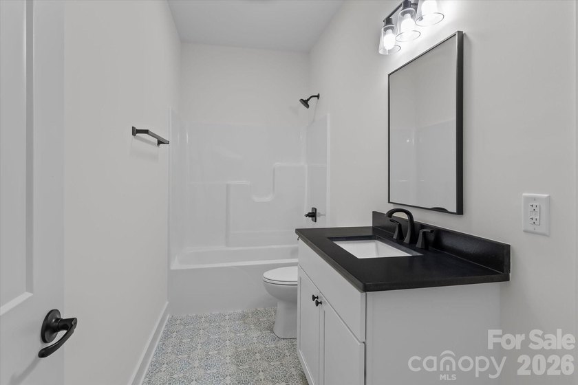 New Construction ranch home on large lot with bonus room above - photo 23