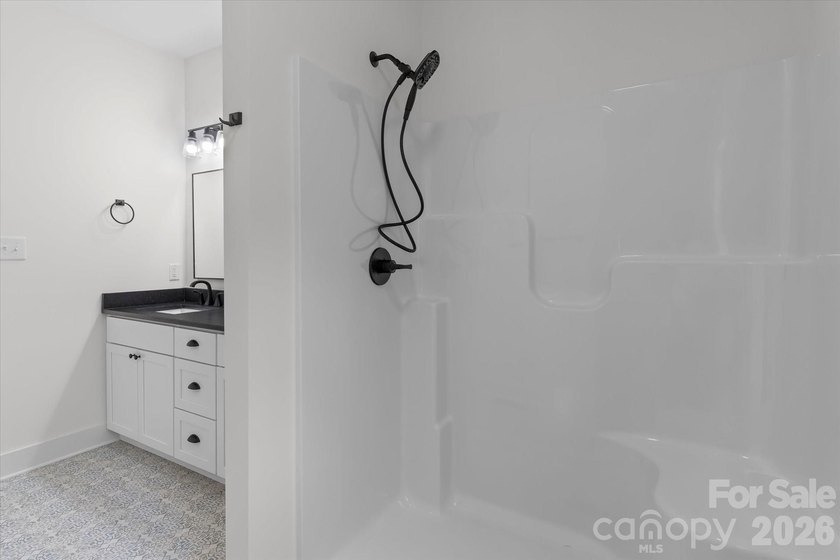 New Construction ranch home on large lot with bonus room above - photo 30