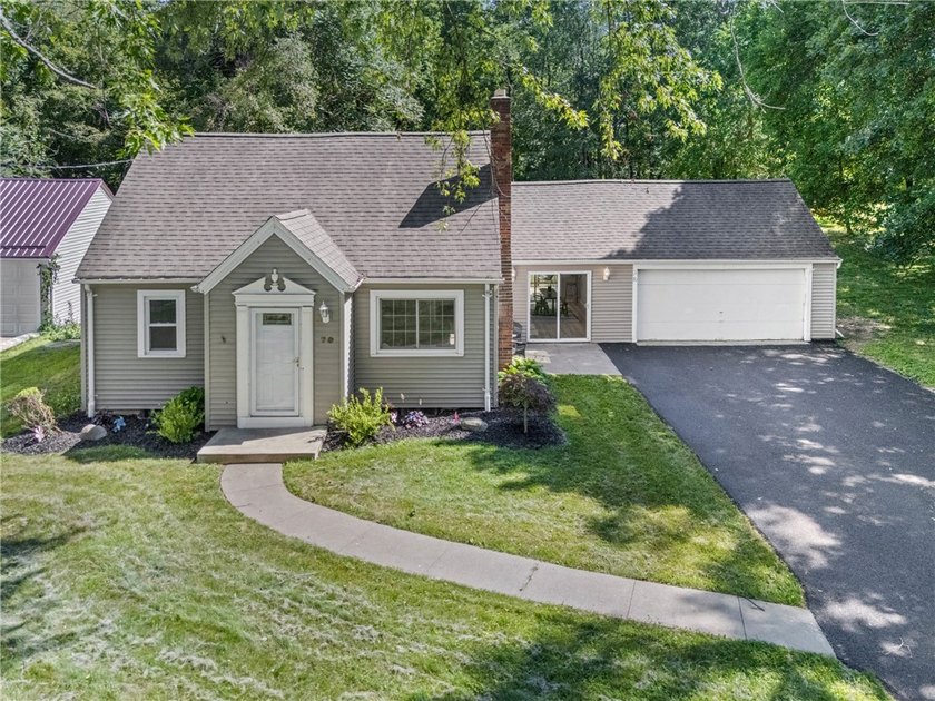 STEP INTO THE PERFECT STORYBOOK HOME that is OVERFLOWING with - photo 3