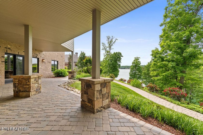 Experience exceptional lakefront living in this custom estate - photo 47