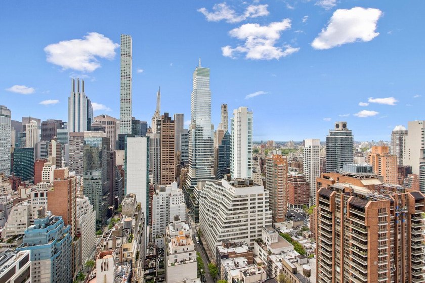 Perched high above Midtown East with breathtaking skyline views - photo 9