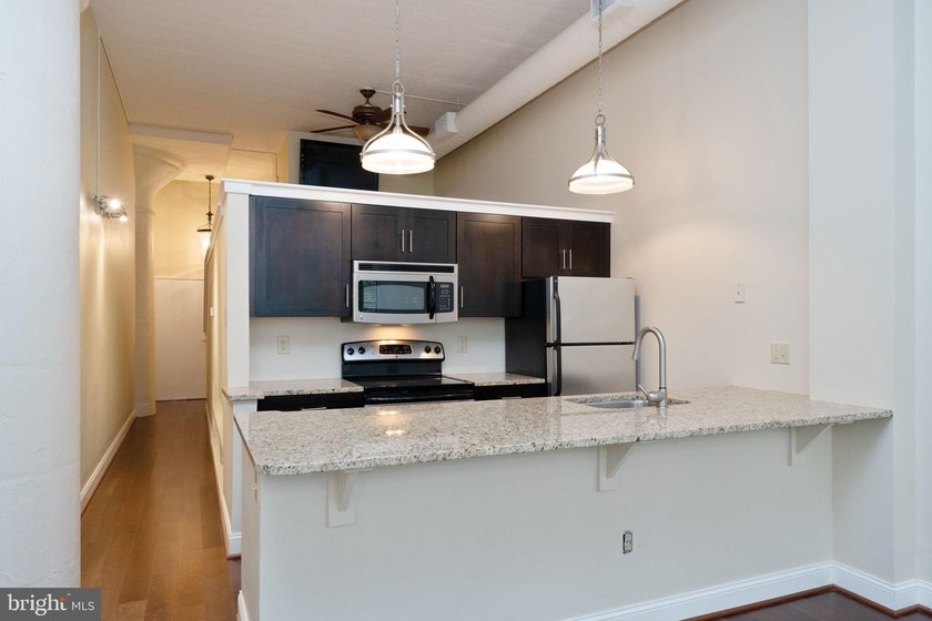 Step into elevated city living with this stunning, light-filled - photo 8