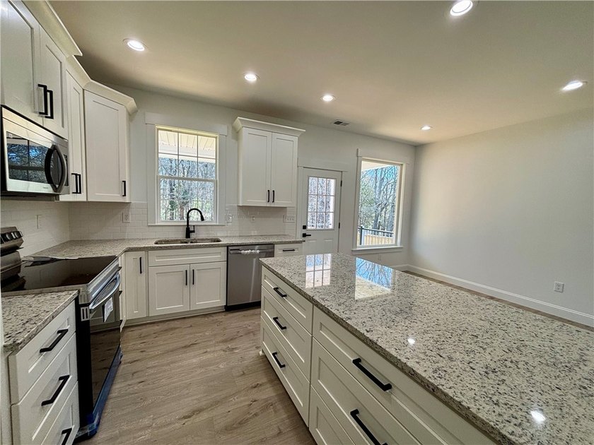 Brand new 3BR/2BA home with NO HOA fees offering a desirable - photo 6