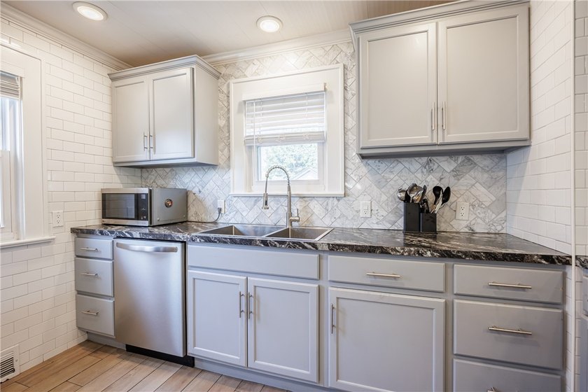 Move right into this beautifully renovated home where modern - photo 7