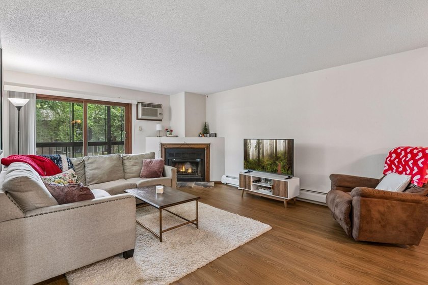 Rarely available corner unit with 3 bedrooms, 2 bathrooms, and 2 - photo 3