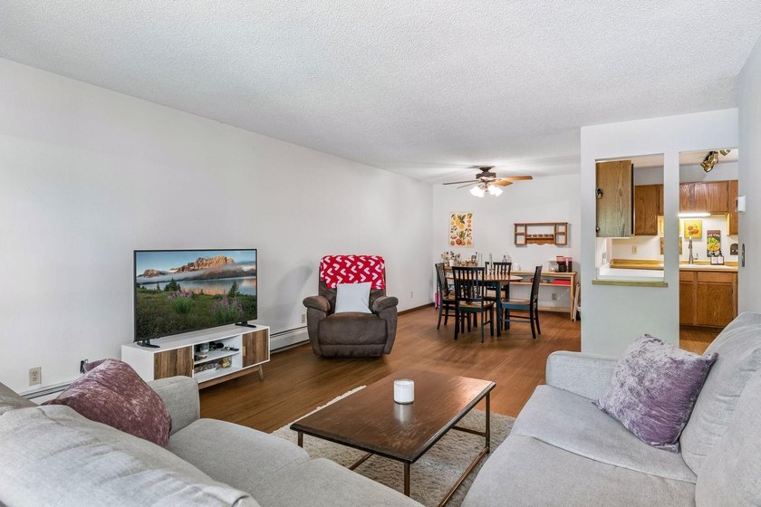 Rarely available corner unit with 3 bedrooms, 2 bathrooms, and 2 - photo 6