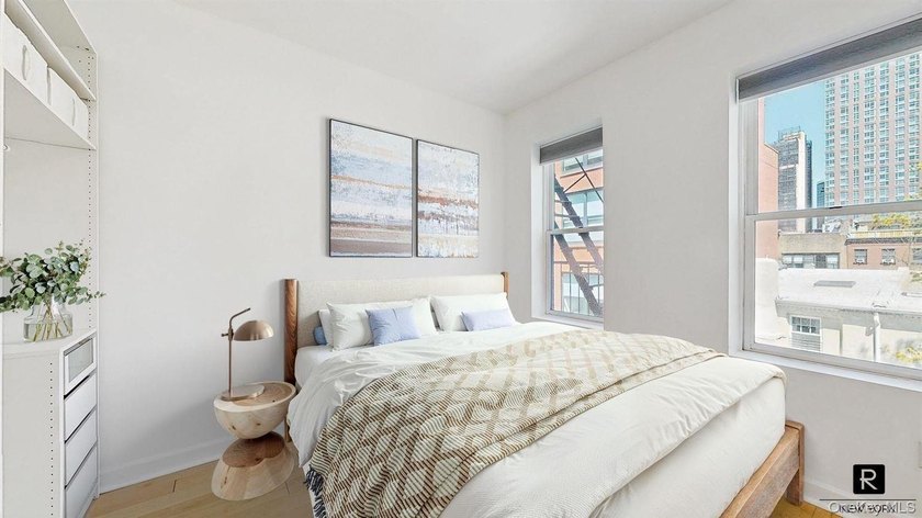 Welcome to this sun-filled, recently renovated two-bedroom home - photo 7