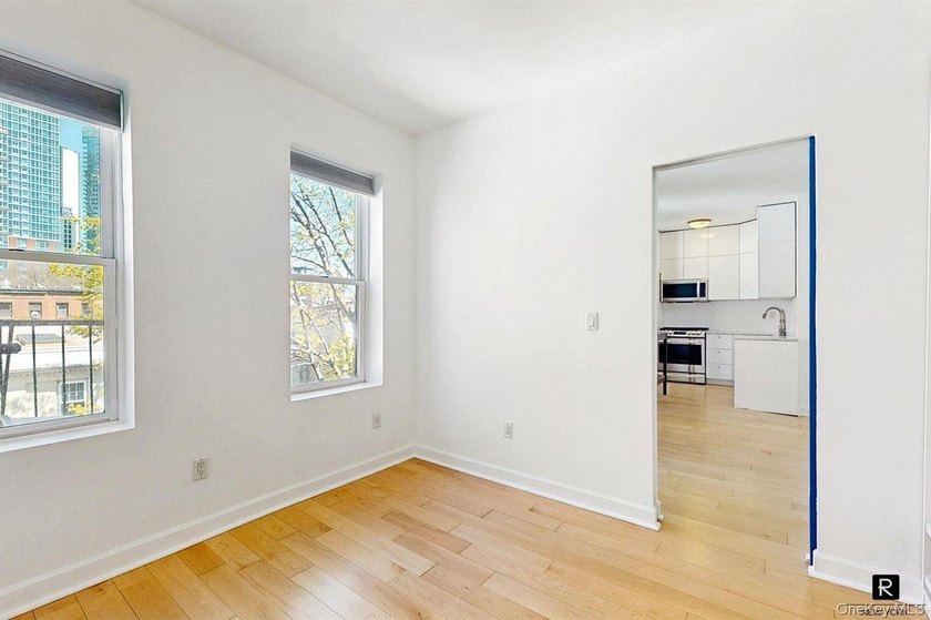 Welcome to this sun-filled, recently renovated two-bedroom home - photo 9
