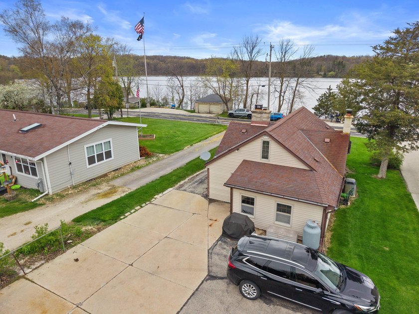 Welcome to Lake Five--where lake living is at its finest. This - photo 12