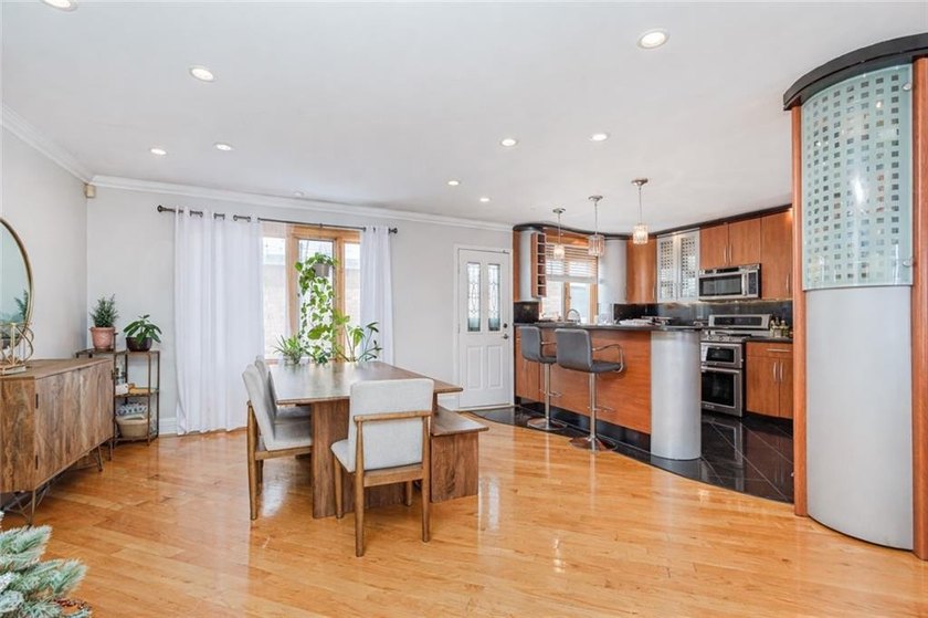 This breathtaking High Ranch corner home with a wraparound - photo 8