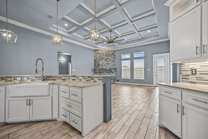 Experience luxury living in this stunning custom-built home - photo 18
