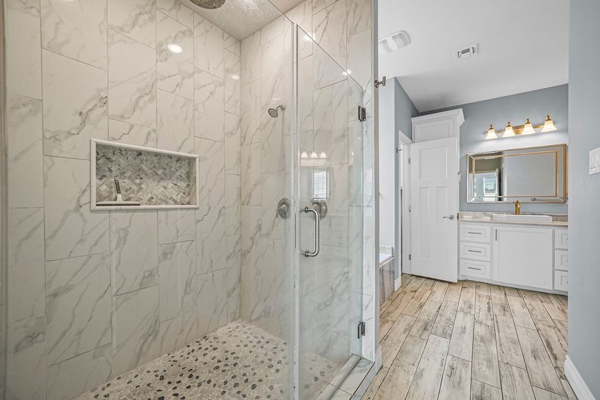 Experience luxury living in this stunning custom-built home - photo 24