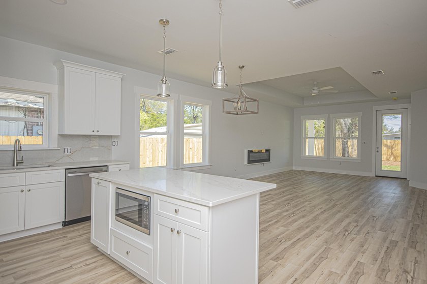 Step into this semi-custom home beautifully designed with plenty - photo 2