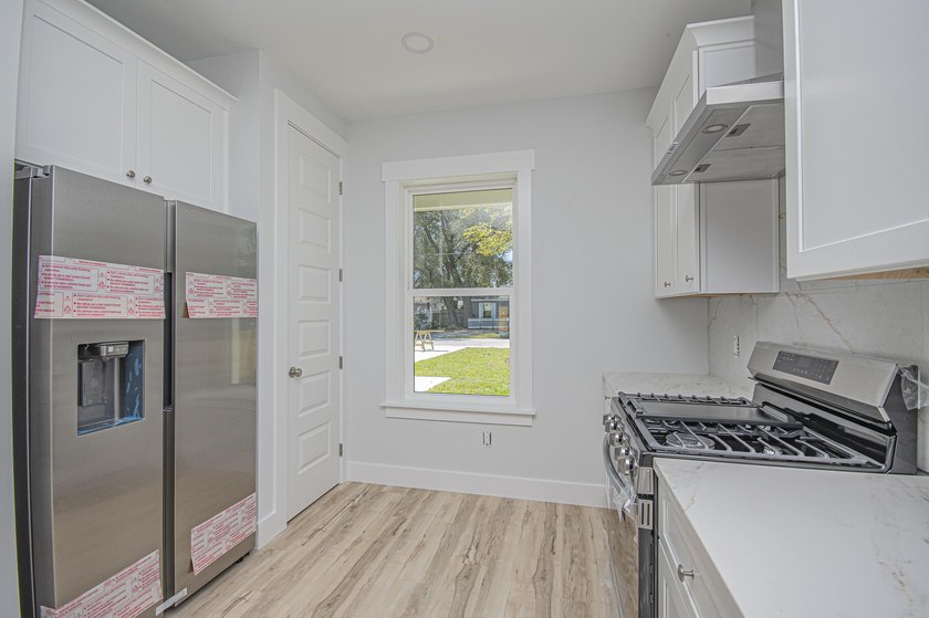 Step into this semi-custom home beautifully designed with plenty - photo 8