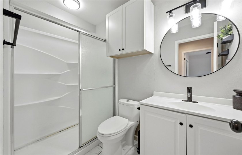 Desirable Lakewood Village featuring laminate and tile flooring - photo 12