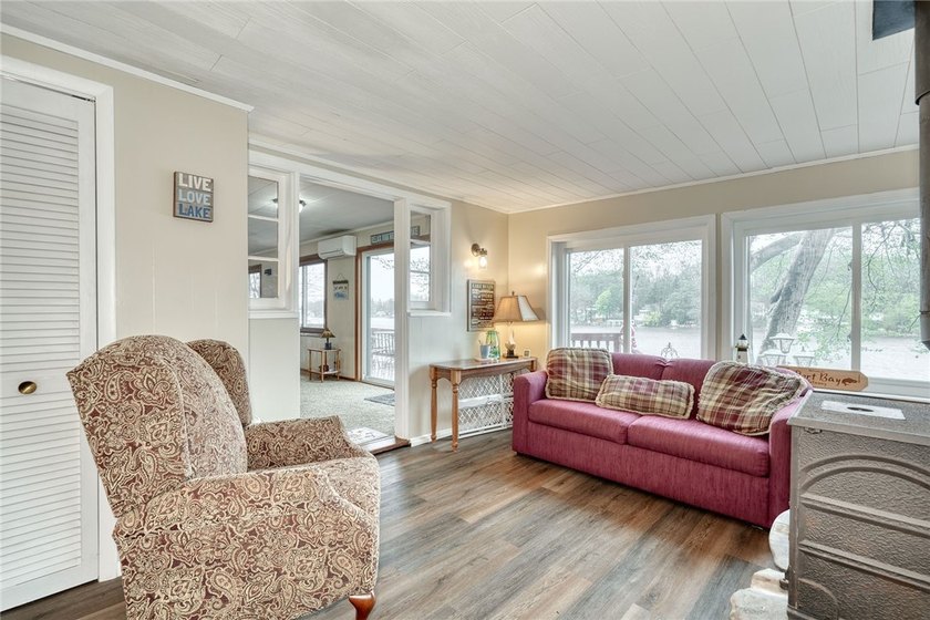 Tucked into the hillside, this awesome lakefront home offers so - photo 9