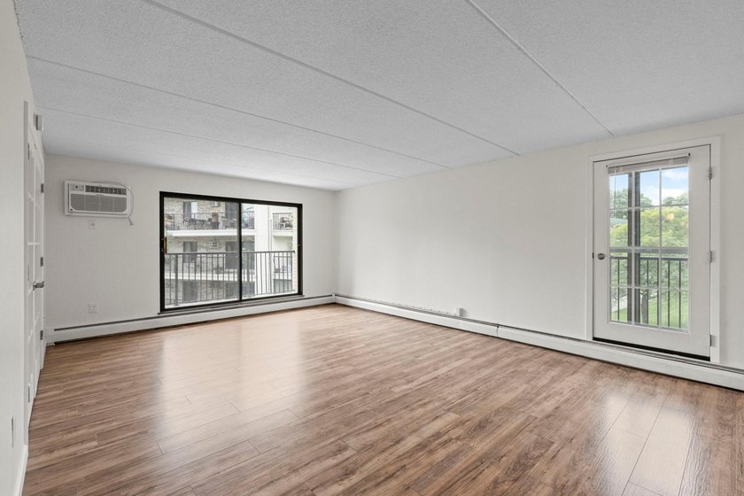 Rare opportunity to own a stunning 4th-floor corner unit in the - photo 3