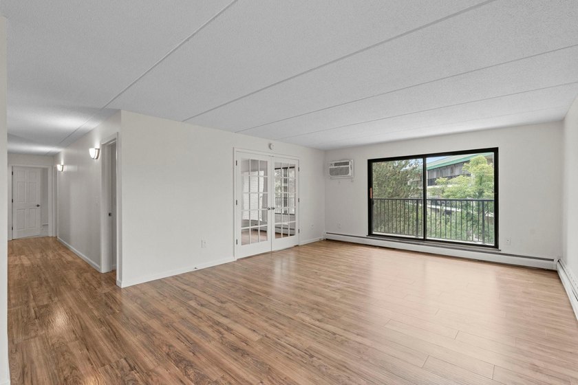 Rare opportunity to own a stunning 4th-floor corner unit in the - photo 4