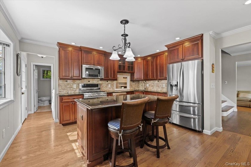 Welcome to Miller Place! This spacious 4-bedroom colonial offers - photo 11