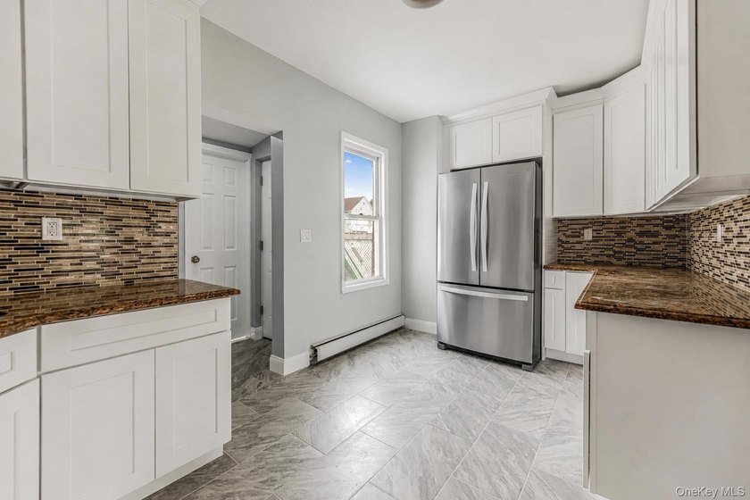 Beautifully renovated 3 bed, 2/1 bath home offering bright and - photo 7