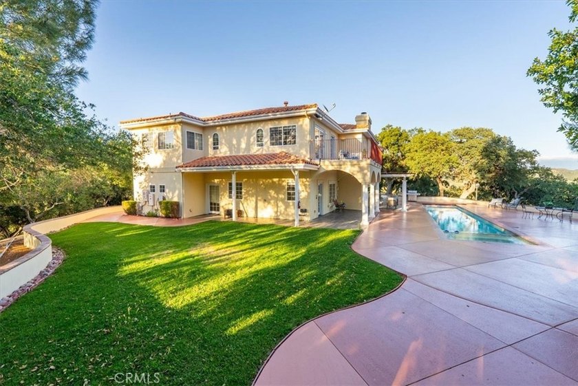 Perched atop one of the highest hills in Atascadero, this grand - photo 29