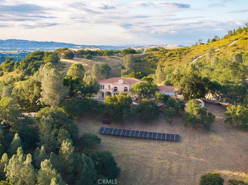 Perched atop one of the highest hills in Atascadero, this grand - photo 32