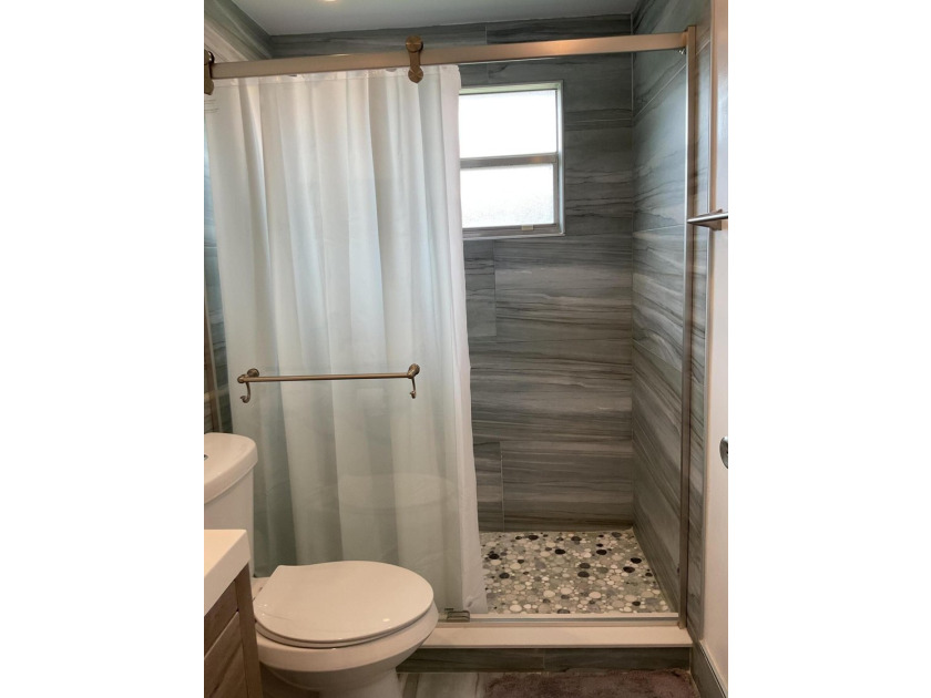 Welcome to this charming 2-bedroom, 2-bathroom villa in Delray - photo 13