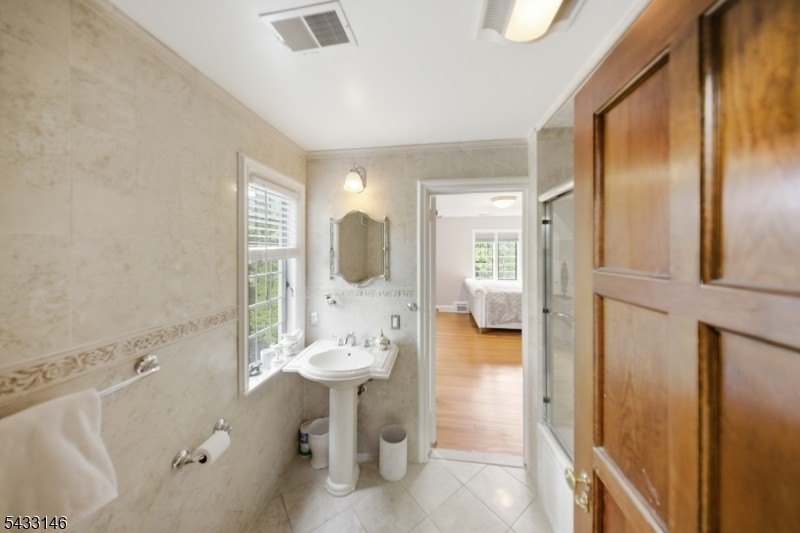 Set on over an acre of exquisitely landscaped grounds, this - photo 21