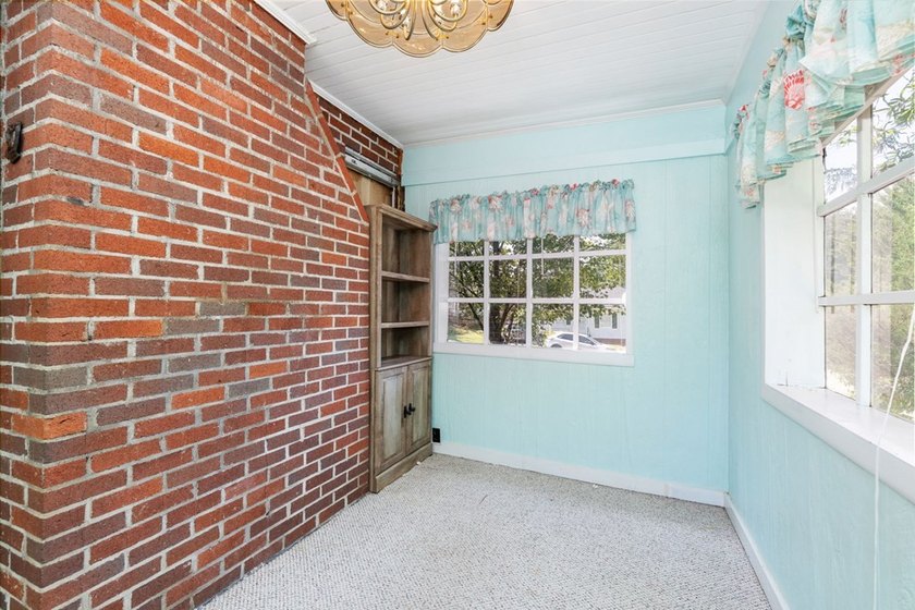 Charming 2-bedroom, 1-bath brick home situated on a corner lot - photo 14