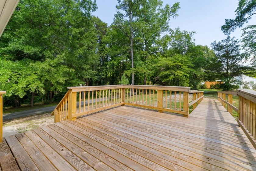 Charming 2-bedroom, 1-bath brick home situated on a corner lot - photo 25