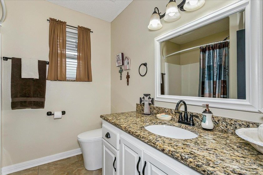 Beautifully updated 4-bedroom, 2.5-bath home situated on a HUGE - photo 22