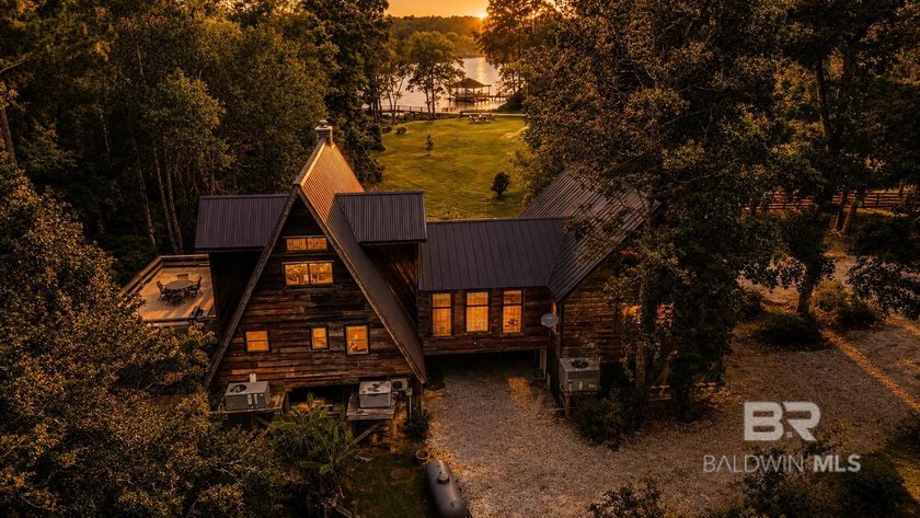 Tucked away on approximately 5 private, high-and-dry acres along - photo 3