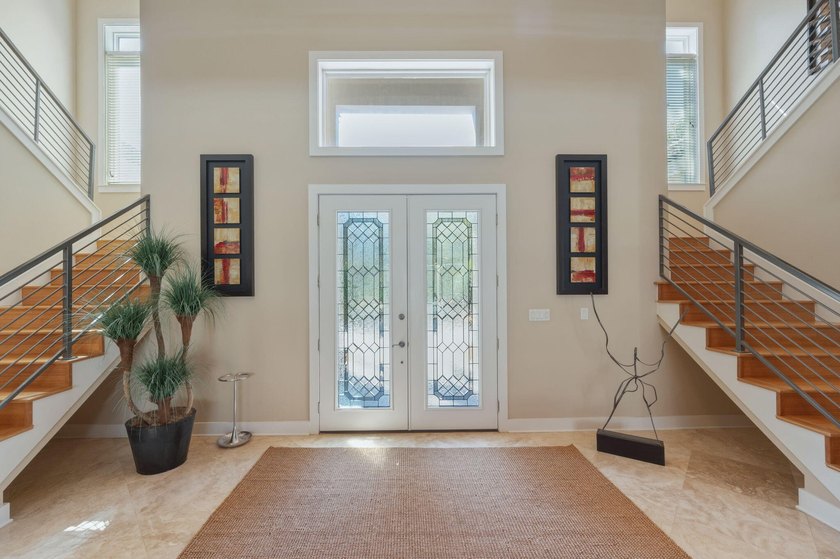 Experience refined coastal luxury in this exceptional 4-bedroom - photo 3